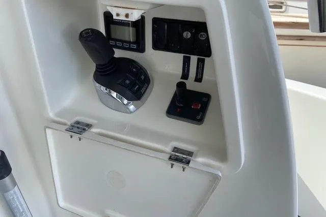 Slide: The Image of Control panel of a 2016 Prestige 450 S yacht with joystick and switches. - 26
