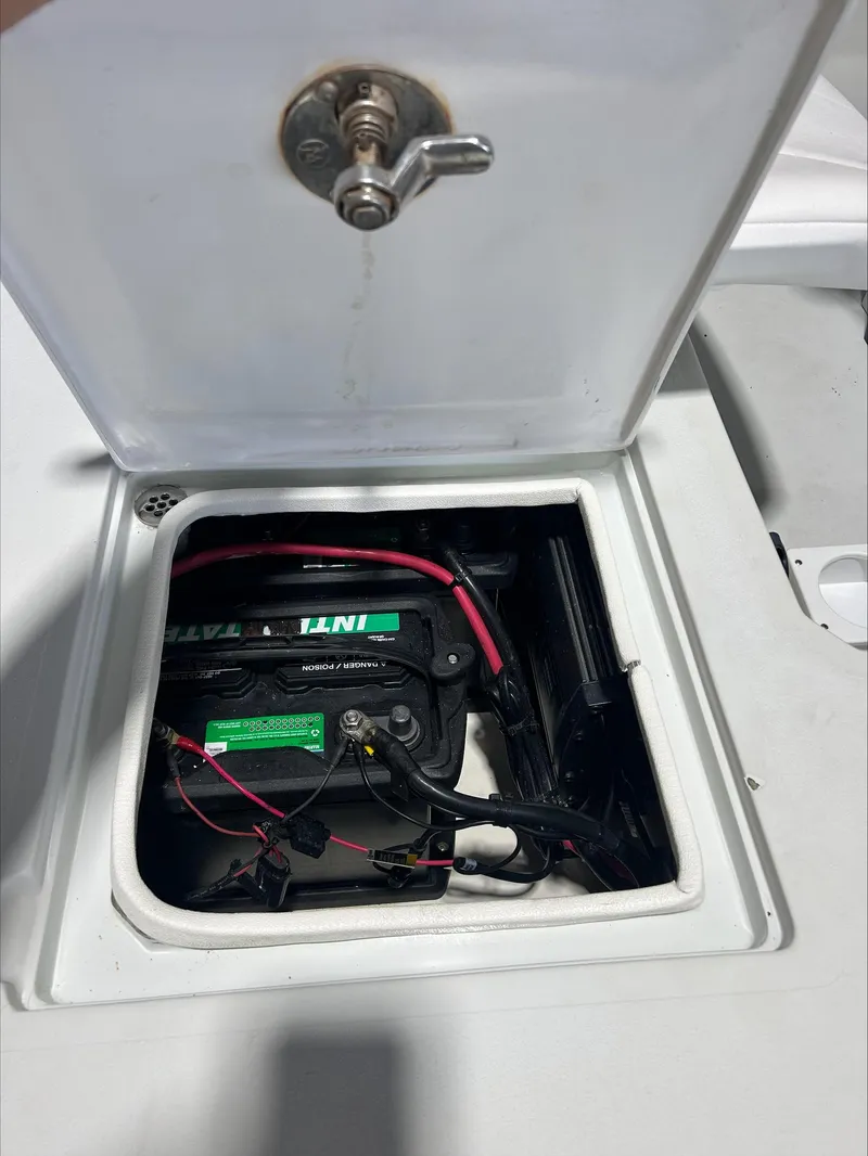 Slide: The Image of Battery compartment of 2008 Lake & Bay Boca Grande boat, showing wiring and connections. - 10