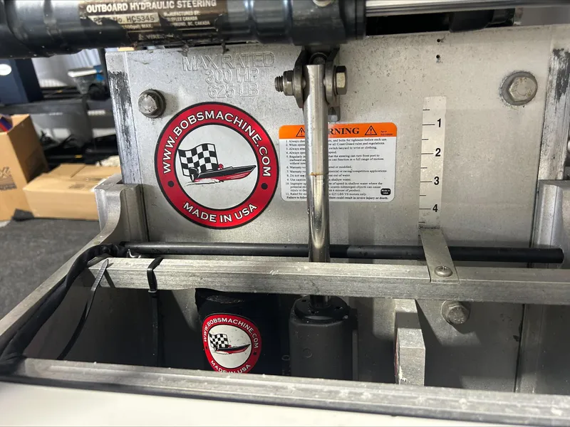 Slide: The Image of 2008 Lake & Bay Boca Grande boat hydraulic steering system with Bob's Machine components. - 21