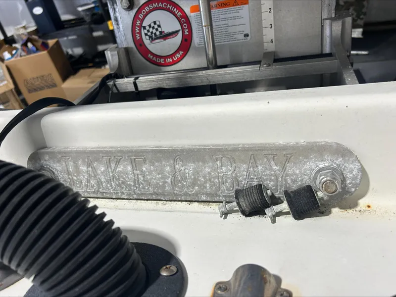 Slide: The Image of 2008 Lake & Bay Boca Grande boat detail with Bob's Machine logo and hardware. - 22