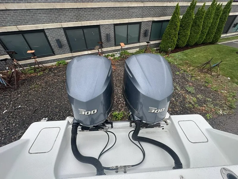 Slide: The Image of Twin Yamaha 300 outboard engines on a 2012 Onslow Bay 27 OE boat. - 23