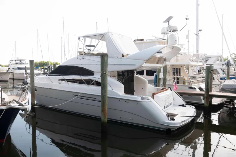 The Image of 2003 Princess 50 yacht docked at marina, featuring sleek design and spacious deck. - 0