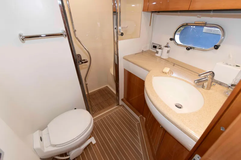 Slide: The Image of Luxurious bathroom in 2003 Princess 50 yacht with shower, sink, and toilet. - 28