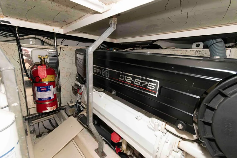 Slide: The Image of Engine room of 2003 Princess 50 yacht with Volvo Penta D12-675 engine. - 33