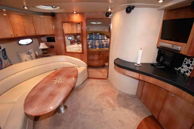 Slide: The Image of Luxurious interior of 2003 Regal Commodore 4260 yacht with elegant seating and modern amenities. - 14