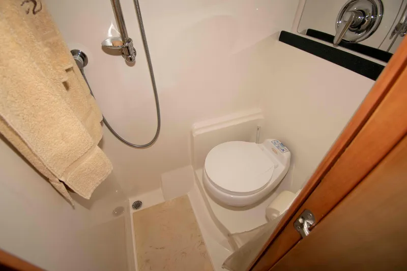 Slide: The Image of Compact bathroom in 2003 Regal Commodore 4260 yacht with shower and toilet. - 21