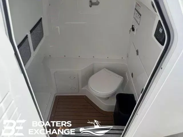 Slide: The Image of Interior of Everglades 285 Center Console 2026 with toilet. - 9