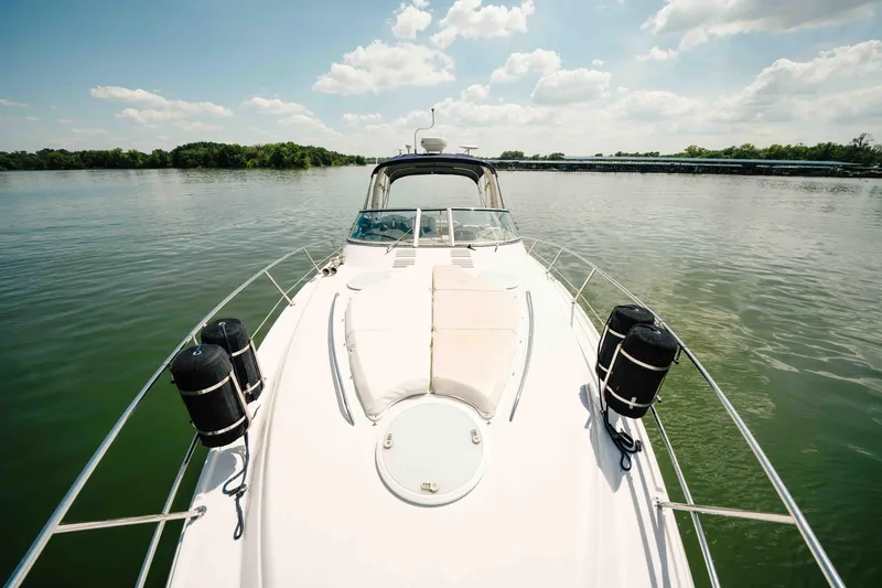 Slide: The Image of 2006 Four Winns 348 Vista yacht on calm lake under blue sky. - 18