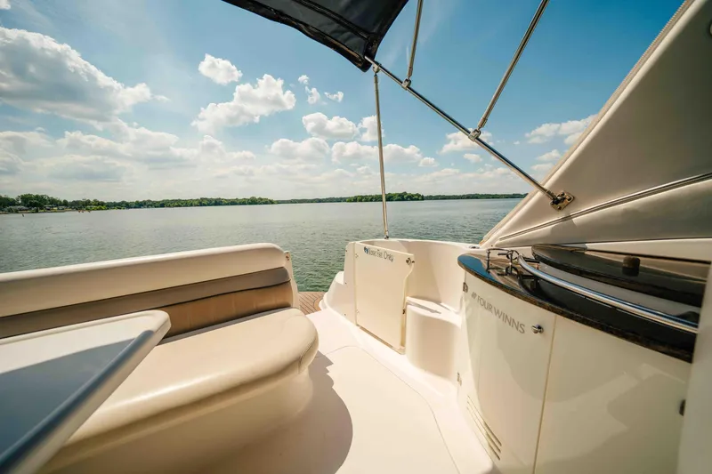 Slide: The Image of 2006 Four Winns 348 Vista boat interior with lake view and clear sky. - 22