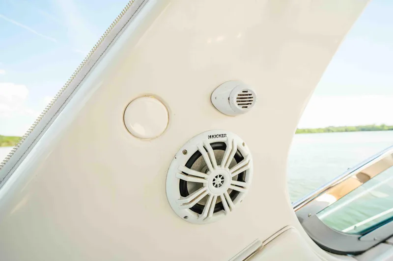 Slide: The Image of 2006 Four Winns 348 Vista boat speaker system with scenic water view. - 28