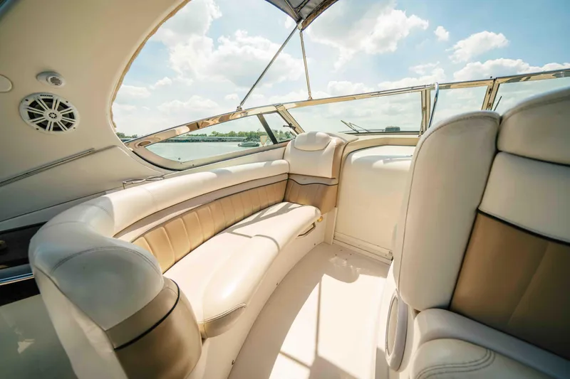 Slide: The Image of Luxurious interior of 2006 Four Winns 348 Vista yacht with plush seating and scenic view. - 36