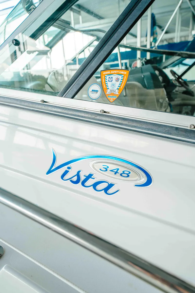 Slide: The Image of 2006 Four Winns 348 Vista boat with safety inspection sticker. - 38