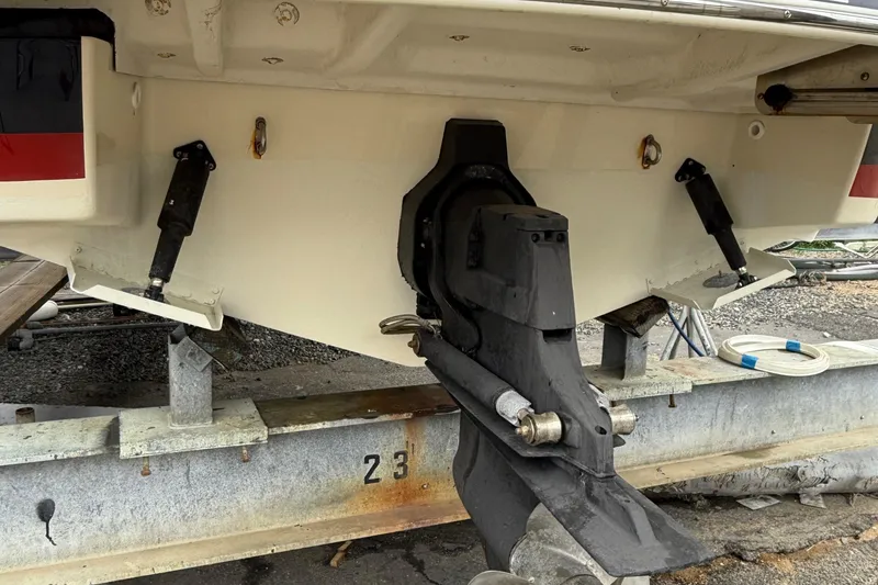 Slide: The Image of 2016 Chris-Craft Launch 22 boat stern with outdrive on trailer. - 14