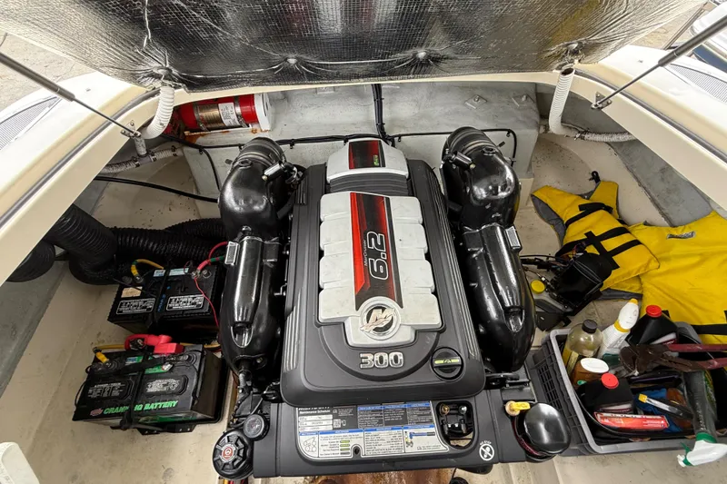 Slide: The Image of Engine compartment of a 2016 Chris-Craft Launch 22, featuring a 6.2L V8 engine. - 5