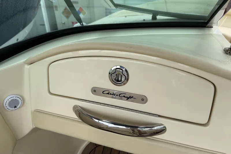 Slide: The Image of 2016 Chris-Craft Launch 22 dashboard with logo and chrome handle. - 9