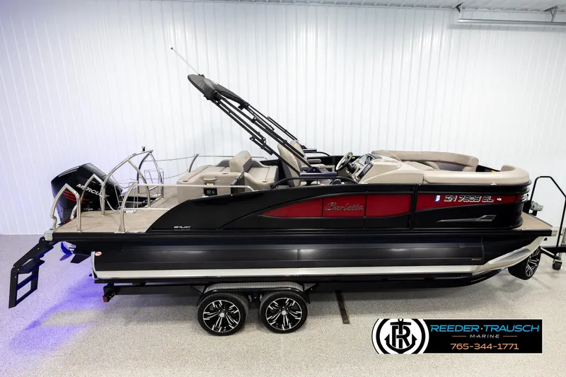 The Image of 2023 Barletta 21 UC pontoon boat on trailer in showroom. - 1
