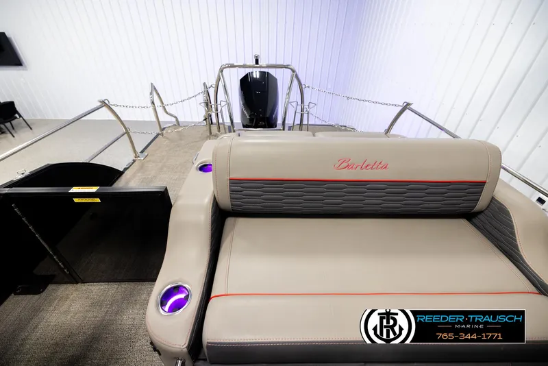 Slide: The Image of 2023 Barletta 21 UC boat interior with plush seating and modern design. - 15