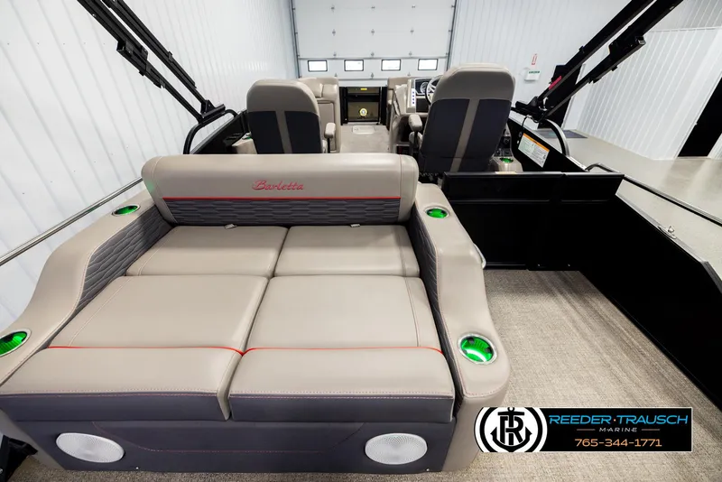 Slide: The Image of 2023 Barletta 21 UC boat interior with plush seating and modern design. - 16