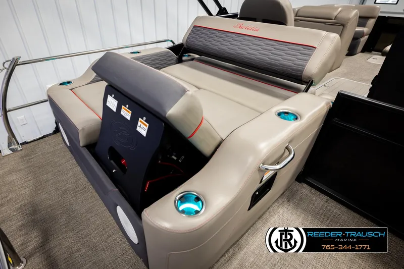 Slide: The Image of 2023 Barletta 21 UC boat interior with plush seating and cup holders. - 27