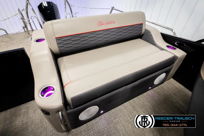 Slide: The Image of 2023 Barletta 21 UC boat seat with cup holders and speaker, showcased by Reeder-Trausch Marine. - 28