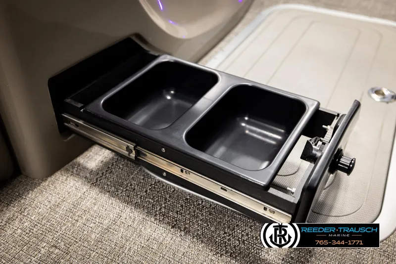 Slide: The Image of 2023 Barletta 21 UC boat with dual cup holder drawer, Reeder-Trausch Marine branding. - 33
