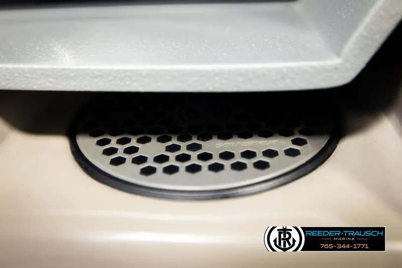 Slide: The Image of Close-up of a 2023 Barletta 21 UC boat speaker with hexagonal grille design. - 40