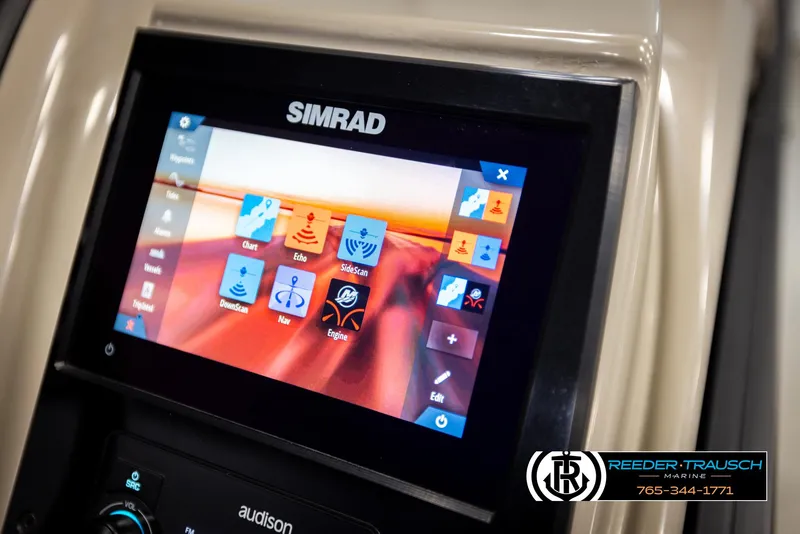Slide: The Image of Simrad display on 2023 Barletta 21 UC boat, featuring navigation and engine controls. - 42