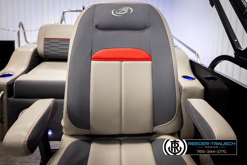 Slide: The Image of 2023 Barletta 21 UC boat seat with gray and red accents, Reeder-Trausch Marine logo. - 46