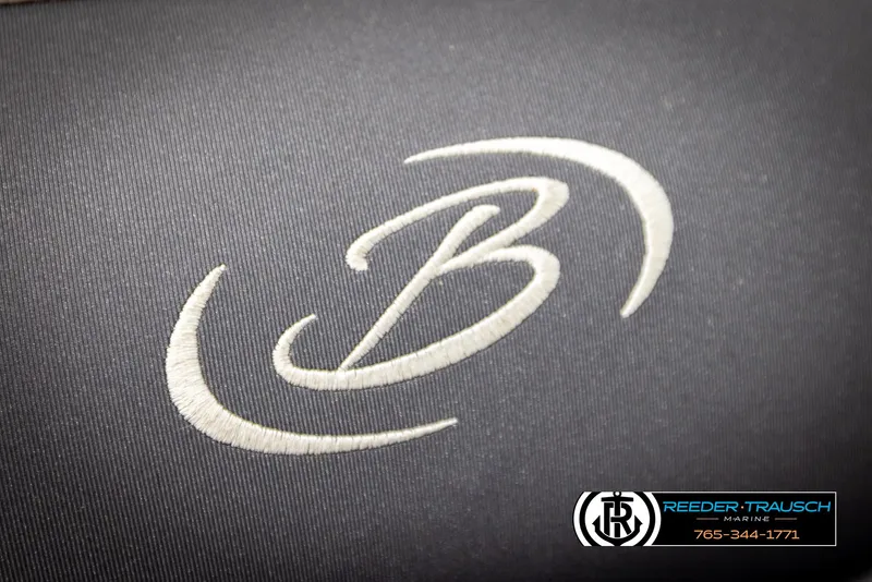Slide: The Image of Barletta 21 UC 2023 logo on dark fabric with Reeder-Trausch Marine contact details. - 47
