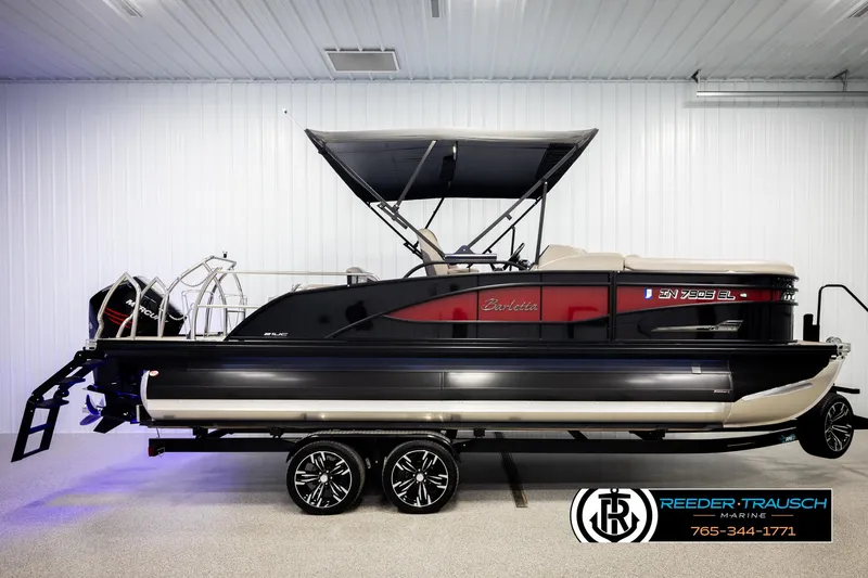 Slide: The Image of 2023 Barletta 21 UC pontoon boat with canopy in showroom. - 5
