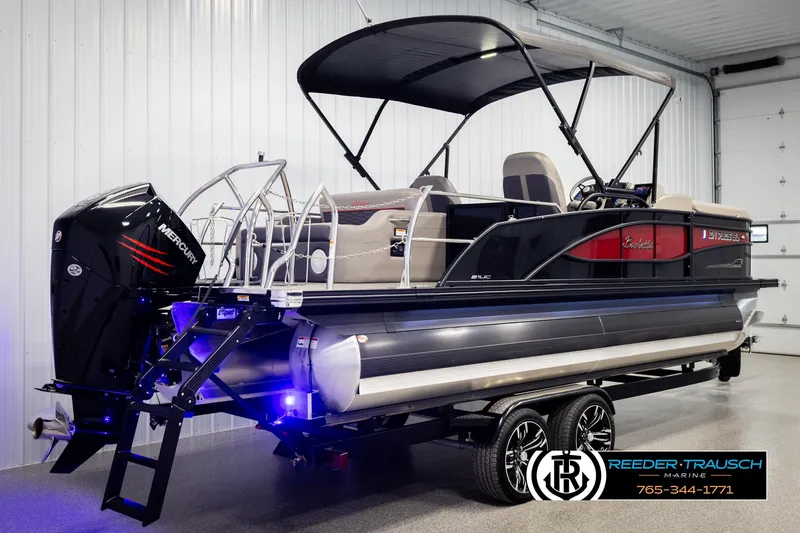 Slide: The Image of 2023 Barletta 21 UC pontoon boat with Mercury engine in showroom. - 6