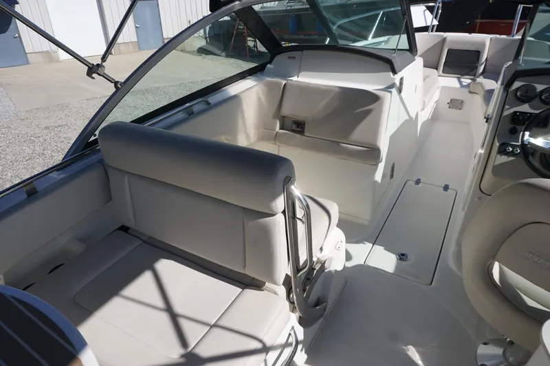 Slide: The Image of 2018 Boston Whaler 230 Vantage boat interior with seating and dashboard. - 17