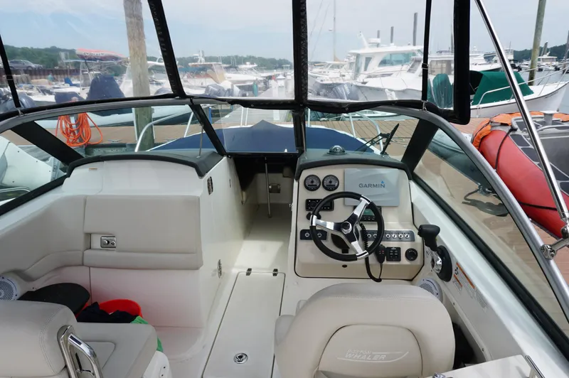 Slide: The Image of Interior view of a 2018 Boston Whaler 230 Vantage boat with Garmin navigation system. - 7