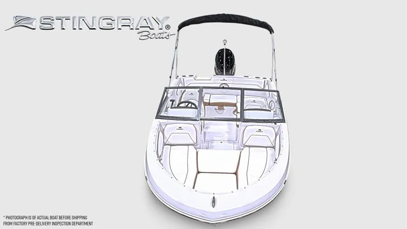 Slide: The Image of 2026 Stingray 172 DC boat with outboard motor, sleek design, and spacious seating. - 5