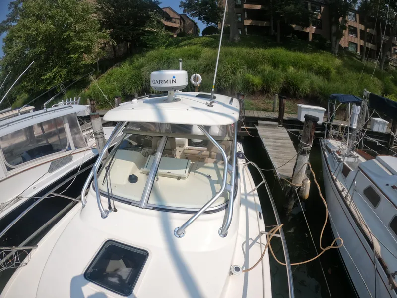 Slide: The Image of 2010 Scout 262 Abaco boat docked with Garmin equipment. - 8