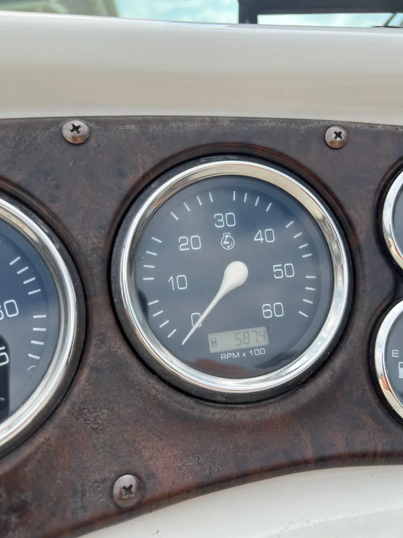 Slide: The Image of Close-up of a Crownline 242 CR 2000 boat tachometer showing RPM gauge. - 11