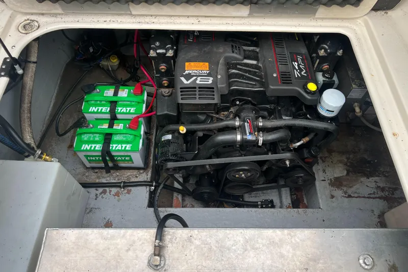 Slide: The Image of Engine compartment of 2000 Crownline 242 CR with V8 MerCruiser and Interstate batteries. - 20
