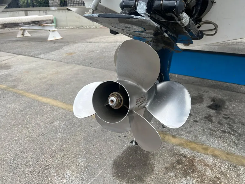 Slide: The Image of Propeller of a 2000 Crownline 242 CR boat on a concrete surface. - 5