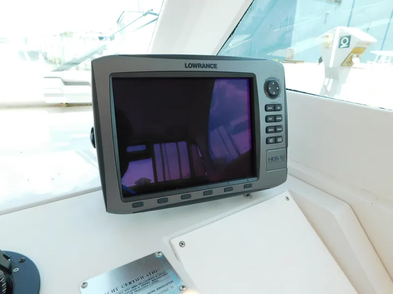 Slide: The Image of Lowrance HDS-10 marine display on 1999 Mainship Pilot 30 boat dashboard. - 26