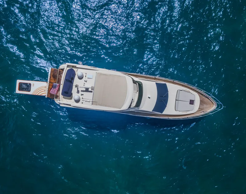 Slide: The Image of Aerial view of 2008 Azimut Flybridge yacht on blue ocean water. - 16