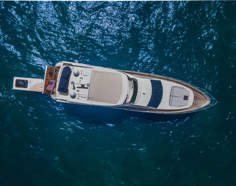 Slide: The Image of Aerial view of 2008 Azimut Flybridge yacht on blue ocean water. - 17