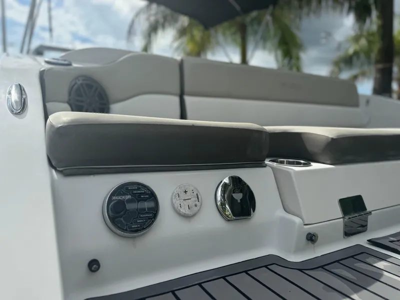 Slide: The Image of 2017 Starcraft 230 OB SCX EXT boat interior with seating and control panel. - 10