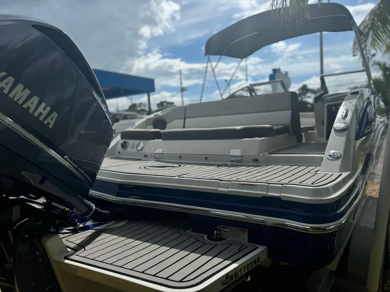 Slide: The Image of 2017 Starcraft 230 OB SCX EXT boat with Yamaha engine, docked under a sunny sky. - 7