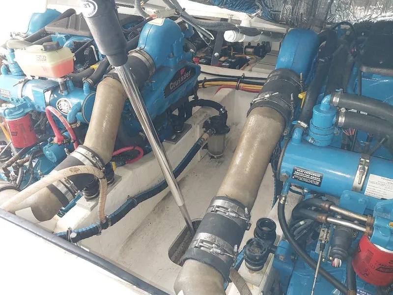 Slide: The Image of Engine compartment of a 2006 Tiara Yachts 2900 Coronet, featuring dual Crusader engines. - 11