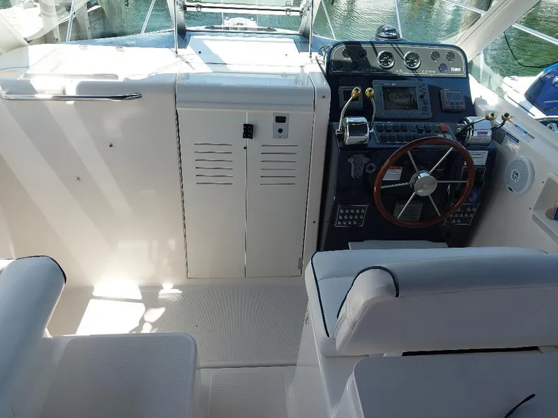 Slide: The Image of 2006 Tiara Yachts 2900 Coronet helm with steering wheel and control panel. - 3