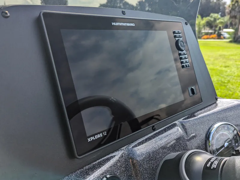 Slide: The Image of Humminbird Xplore 12 display on Falcon F215 boat dashboard, 2026 model. - 11