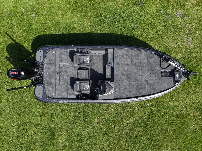 Slide: The Image of Aerial view of 2026 Falcon F215 boat on grass, showcasing spacious deck layout. - 5