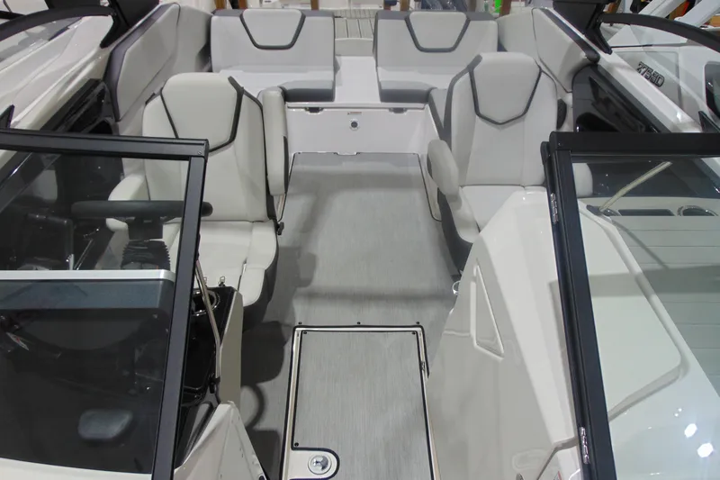 Slide: The Image of 2025 Yamaha Boats AR250 interior with modern seating and sleek design. - 12