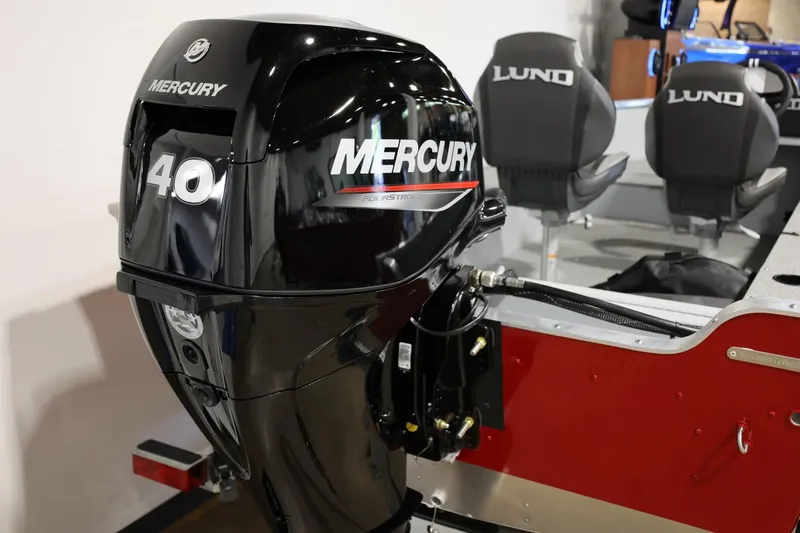 Slide: The Image of 2025 Lund 1600 Fury SS boat with Mercury 40 outboard motor, featuring sleek design. - 3