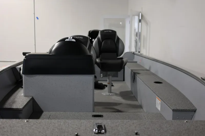 Slide: The Image of 2025 Lund 1600 Fury SS boat interior with seating and console. - 6
